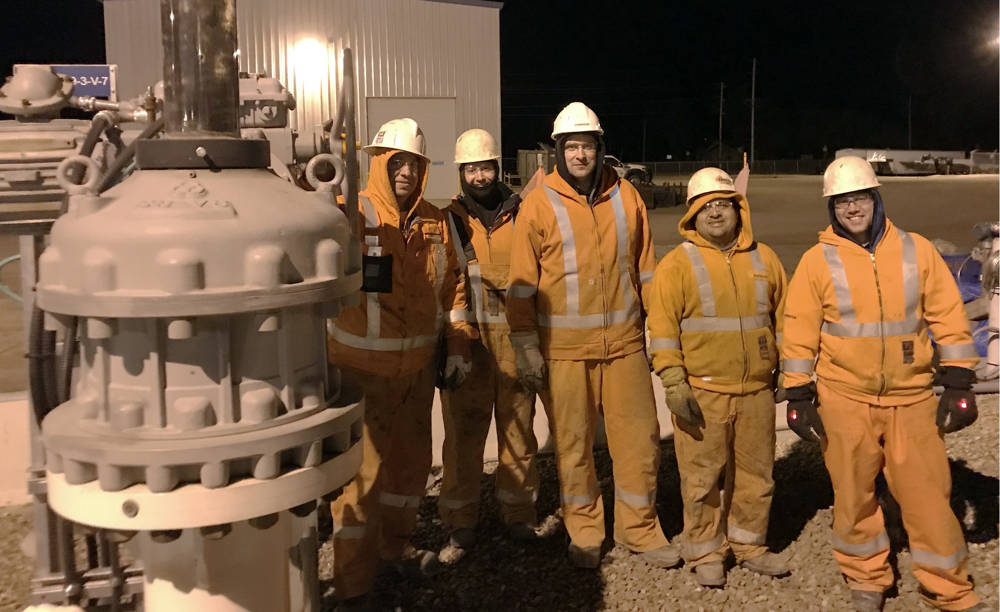 Workers with pipeline tie-in